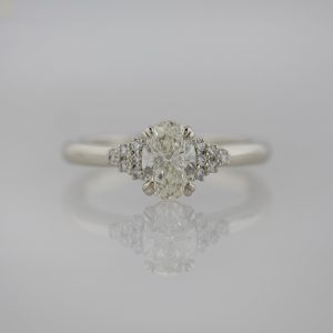 Oval Diamond with Diamond Clusters in 14K White Gold