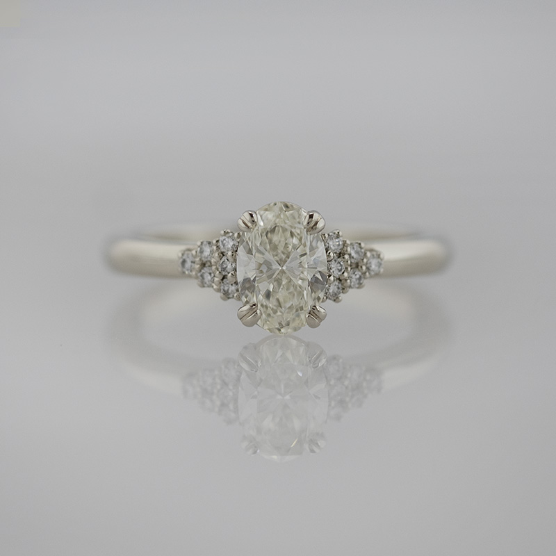 Oval Diamond with Diamond Clusters in 14K White Gold