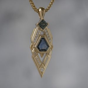 Sapphire and diamond geometric pendant in yellow gold